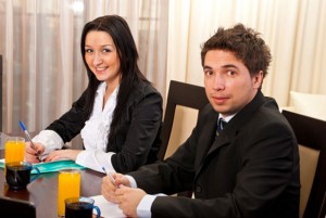 Two people in a business meeting